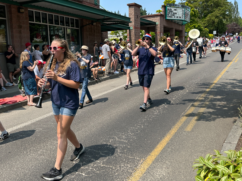 BHS Band marches past the pavilion on Madison Ave