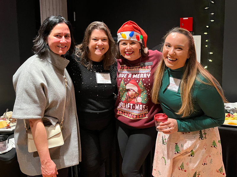 Corinne Wolffe (KiDiMu), Chantelle Lusebrink (Port of Seattle), and Samantha Christopherson (Bainbridge Event Rentals) with the Chamber's Jessica Perkins